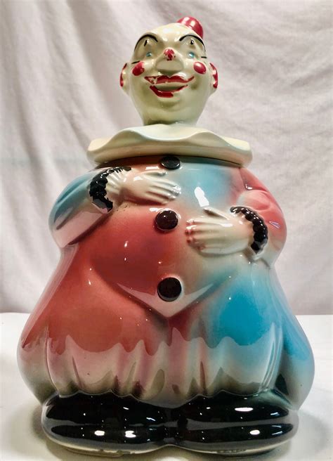 Vintage clown cookie jar - Vintage CLOWN Figural Cookie Jar w/ Wicker Handle JAPAN colorful 1950's. Opens in a new window or tab. Pre-Owned. $15.00. backwoodz_434 (65) 100%. 1 bid · Time left 4h 40m left (Today 07:49 AM) +$12.50 shipping. Vintage 1950s MCM TV Set Cookie Jar - Pocono Mts - Circus Ringmaster w/Elephant.